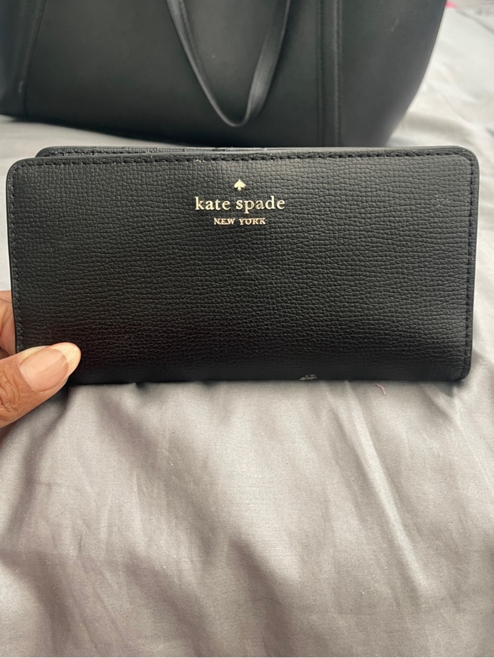 kate spade Black Leather Zip-Around Wallet with Gold Logo